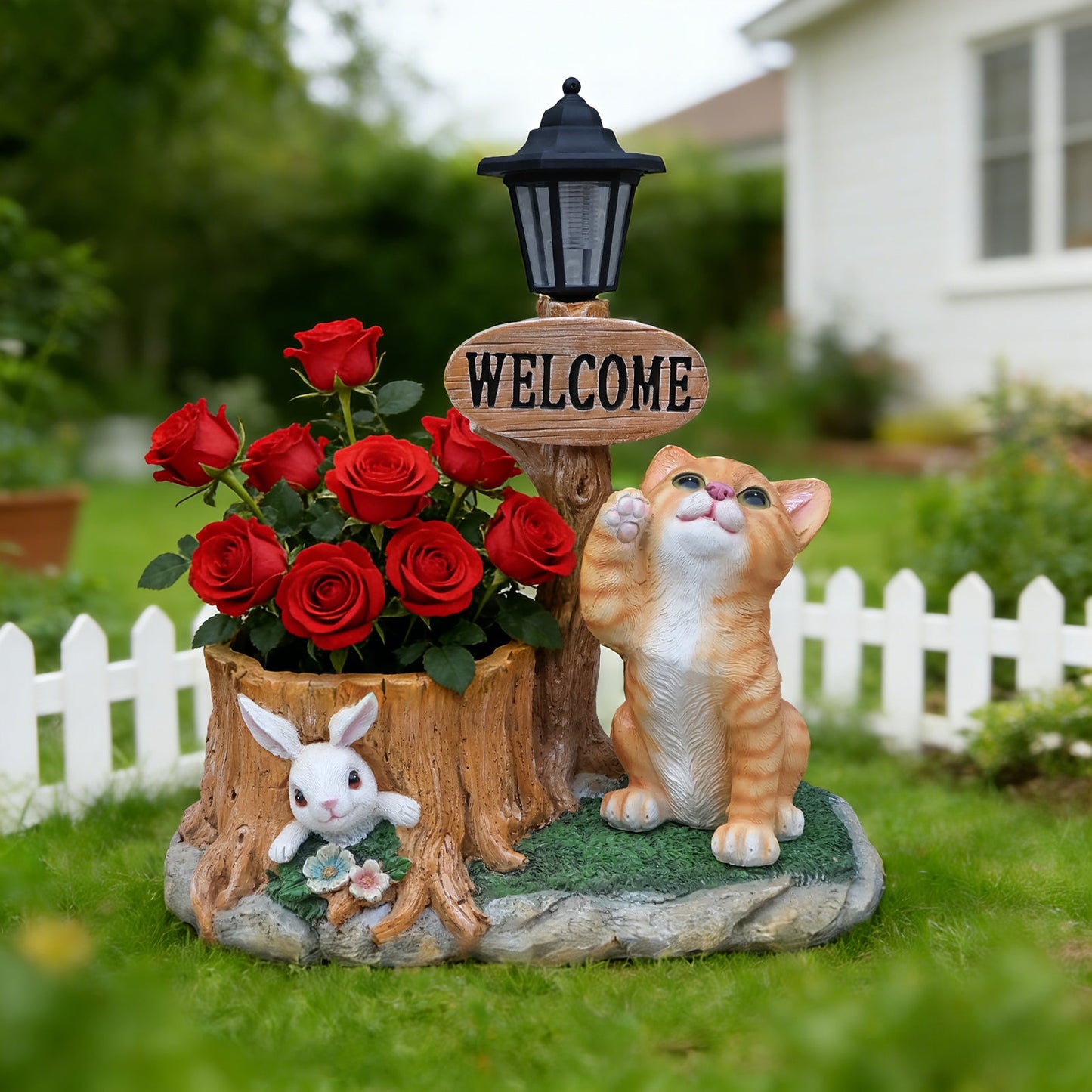 Cute Cat Planter Statue by HouseOfZazla with welcome sign and red roses in a stump planter on Tampa Home & Garden Store