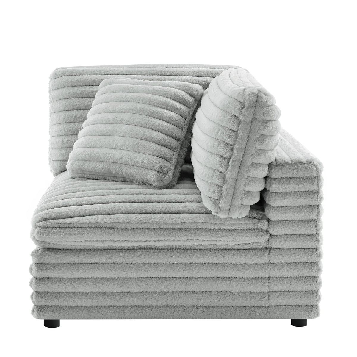 Gray plush throw blankets stacked in a tidy pile with ribbed texture on Tampa Home & Garden Store