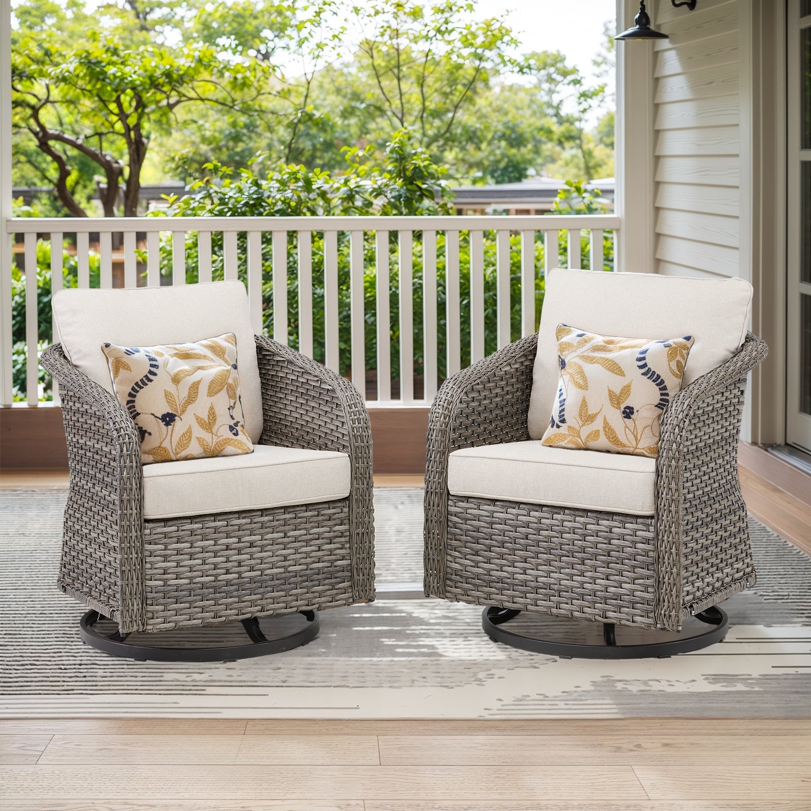 Outdoor swivel rocking wicker chairs set of 2 with beige cushions on a porch deck on Tampa Home & Garden Store