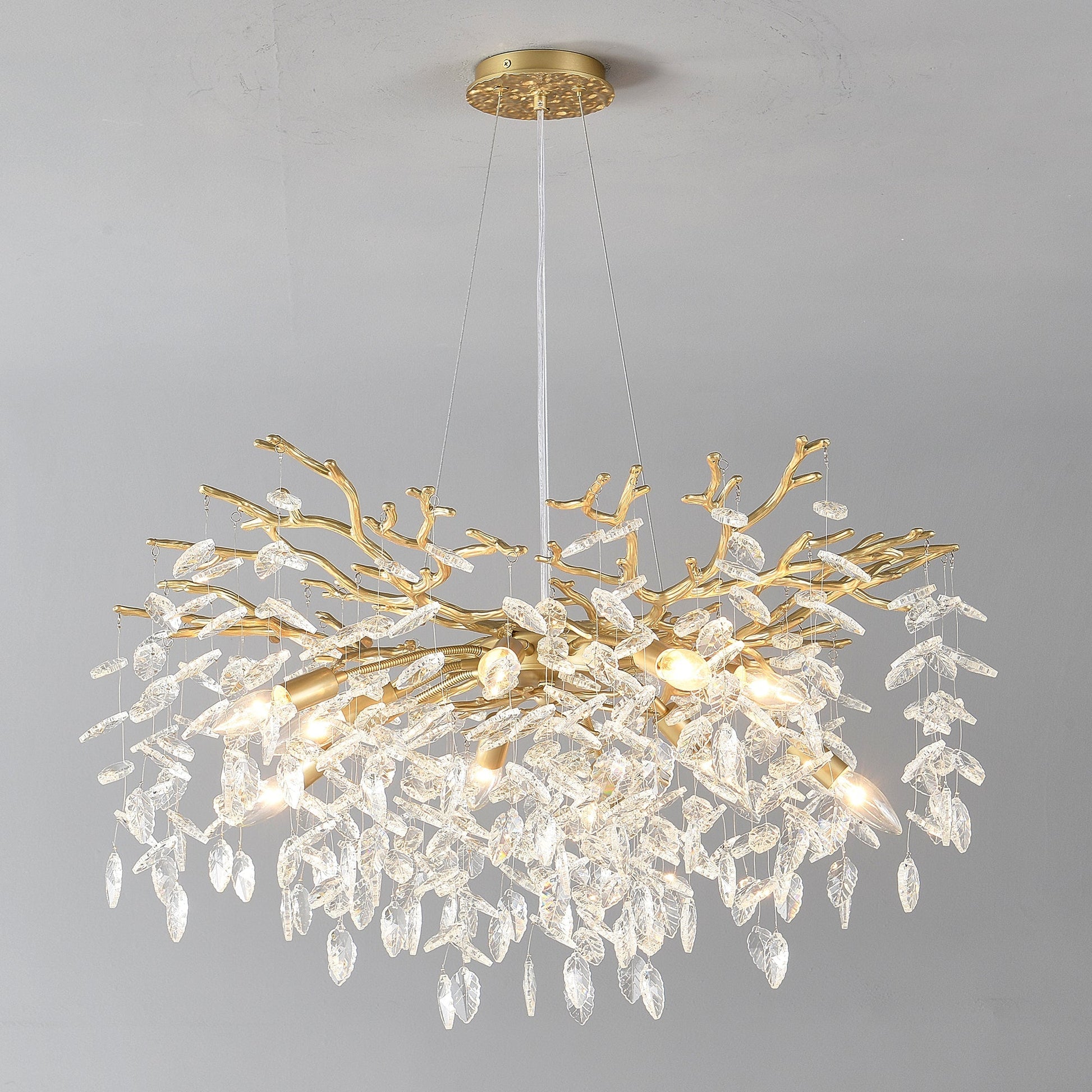 8-light crystal gold chandelier by HouseOfZazla with branch-like arms and hanging crystals on Tampa Home & Garden Store