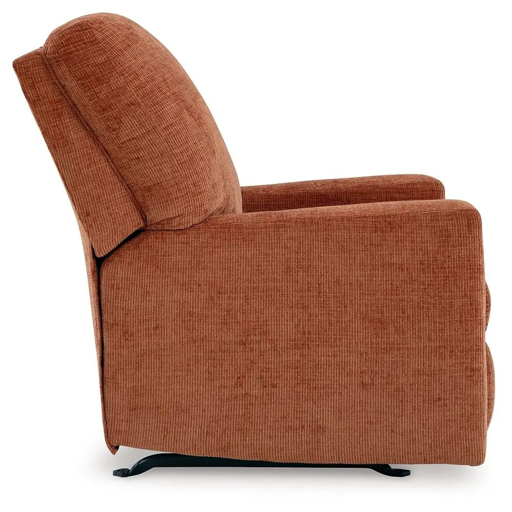 Aviemore rocker recliner in rust-orange fabric with black metal base on Tampa Home & Garden Store