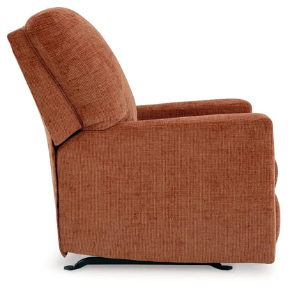 Aviemore rocker recliner in rust-orange fabric with black metal base on Tampa Home & Garden Store