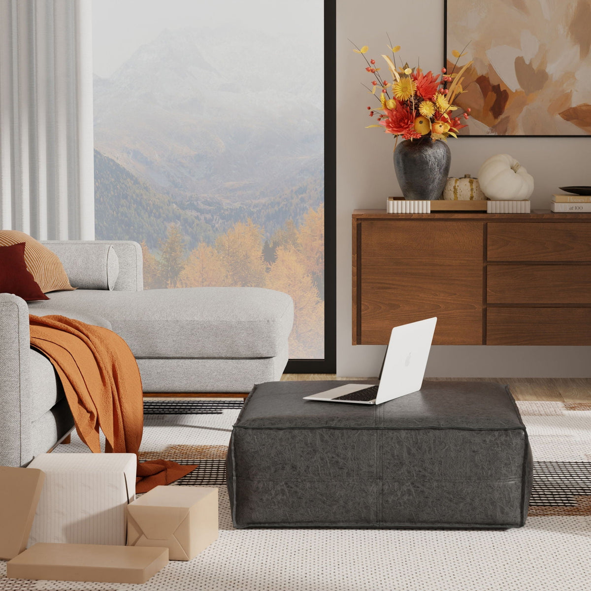 Large square coffee table pouf with vegan cover in dark gray HouseOfZazla beside a console on Tampa Home & Garden Store
