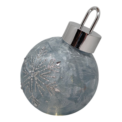 Frosted blue-green lighted snowflake glass ornament with silver cap and hanging loop on Tampa Home & Garden Store