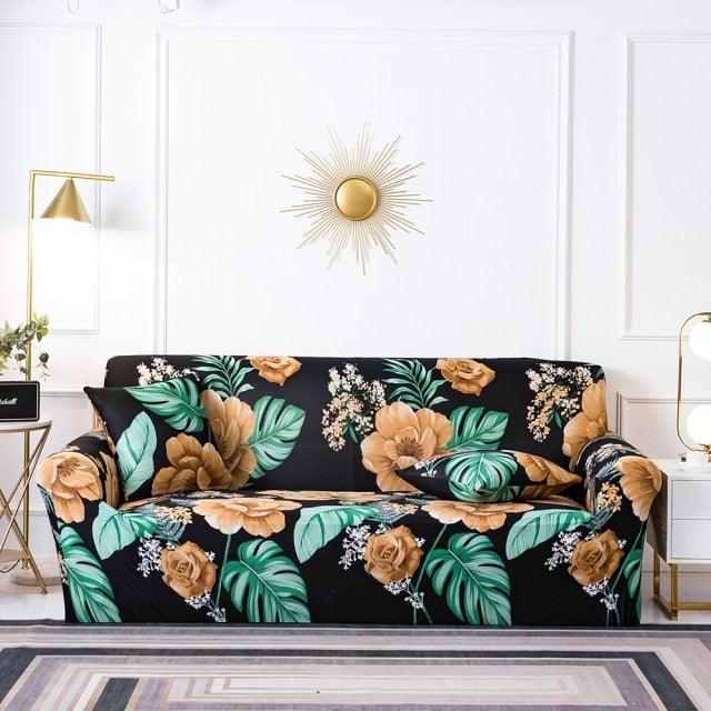 Elastic floral sofa cover in black with orange flowers and green leaves on a 3-seat sofa on Tampa Home & Garden Store