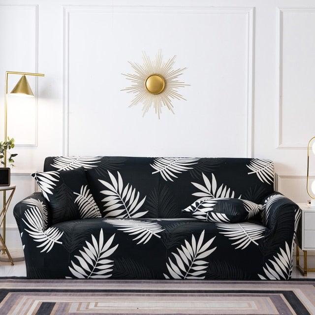 Elastic floral sofa cover in black with white leaf print for a 3-seat couch on Tampa Home & Garden Store