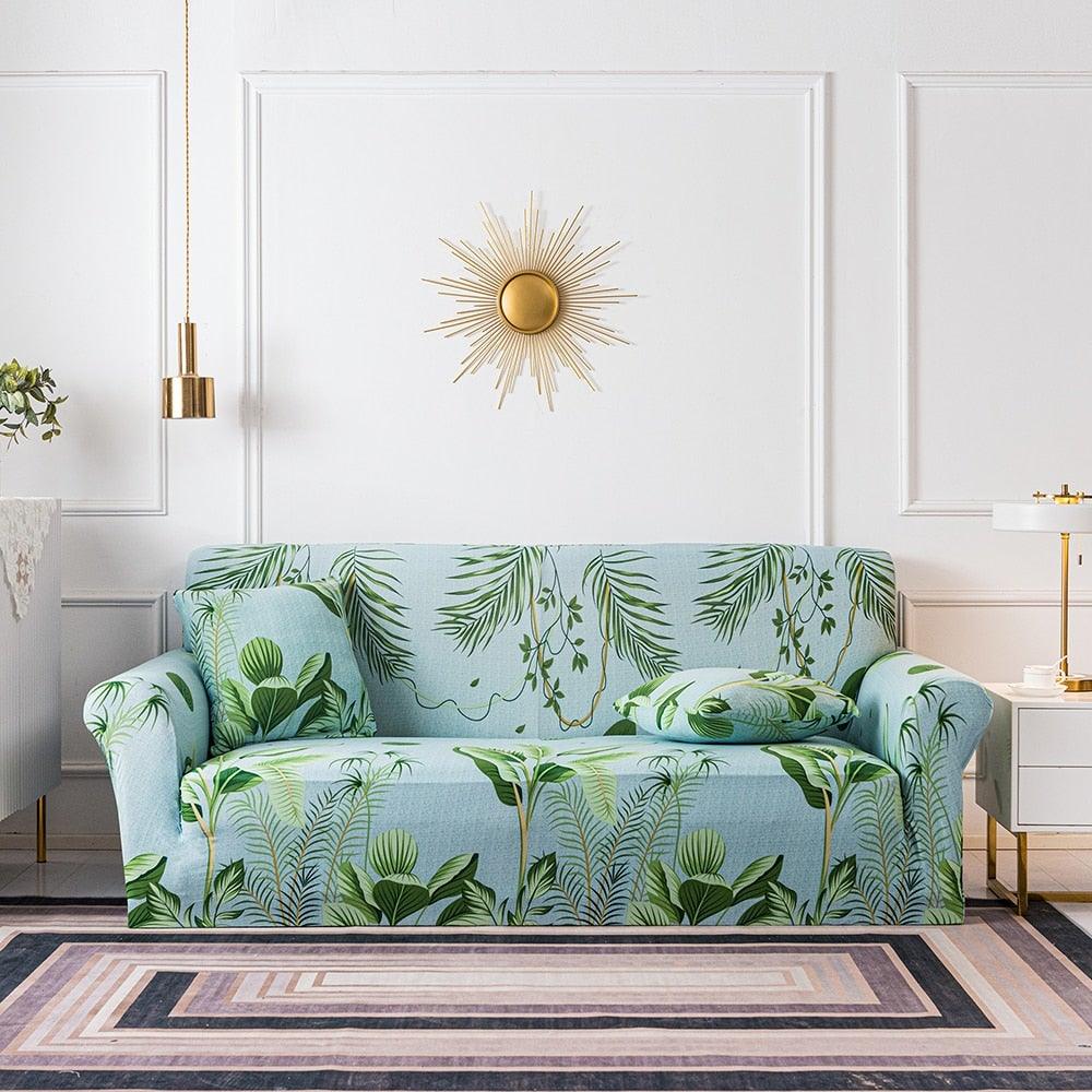 Floral printed sofa cover in light blue with tropical leaves; 3-seat stretch slipcover on Tampa Home & Garden Store