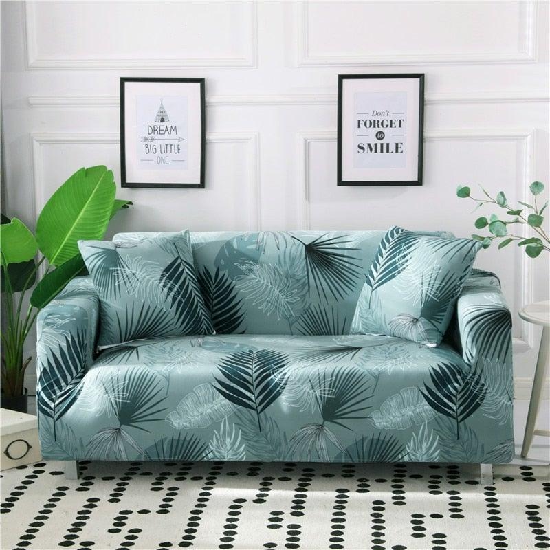 Elastic sofa cover in teal palm-leaf print for living room, Stevvex stretch slipcover fits sofa on Tampa Home & Garden Store