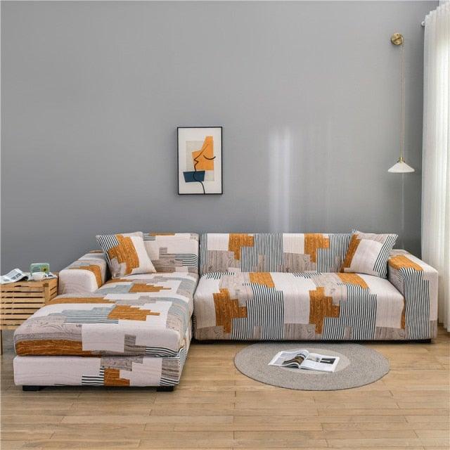 Stevvex elastic sectional sofa cover in orange-gray-white print for L-shaped seater on Tampa Home & Garden Store