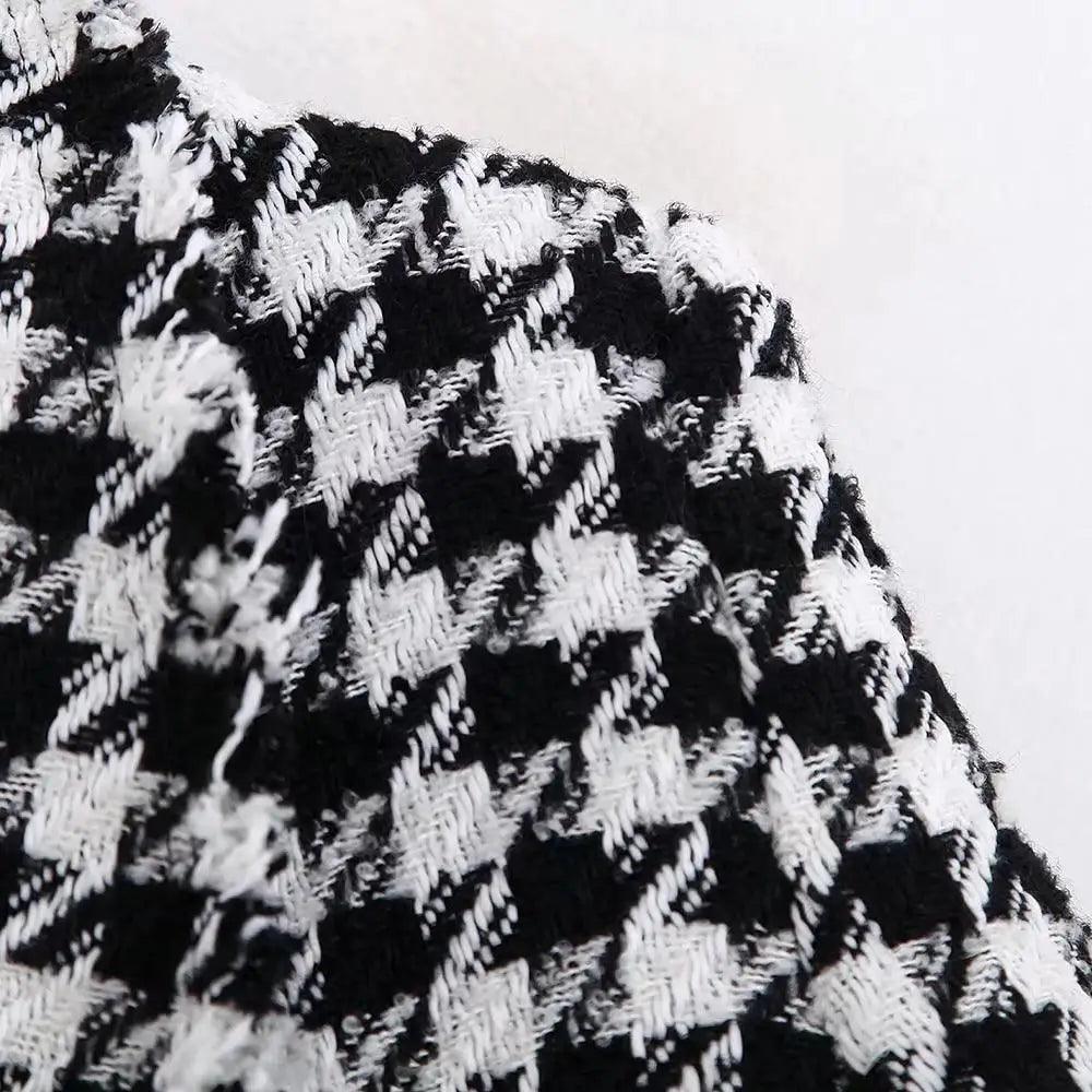 Stevvex black and white houndstooth tweed coat shoulder close-up on Tampa Home & Garden Store