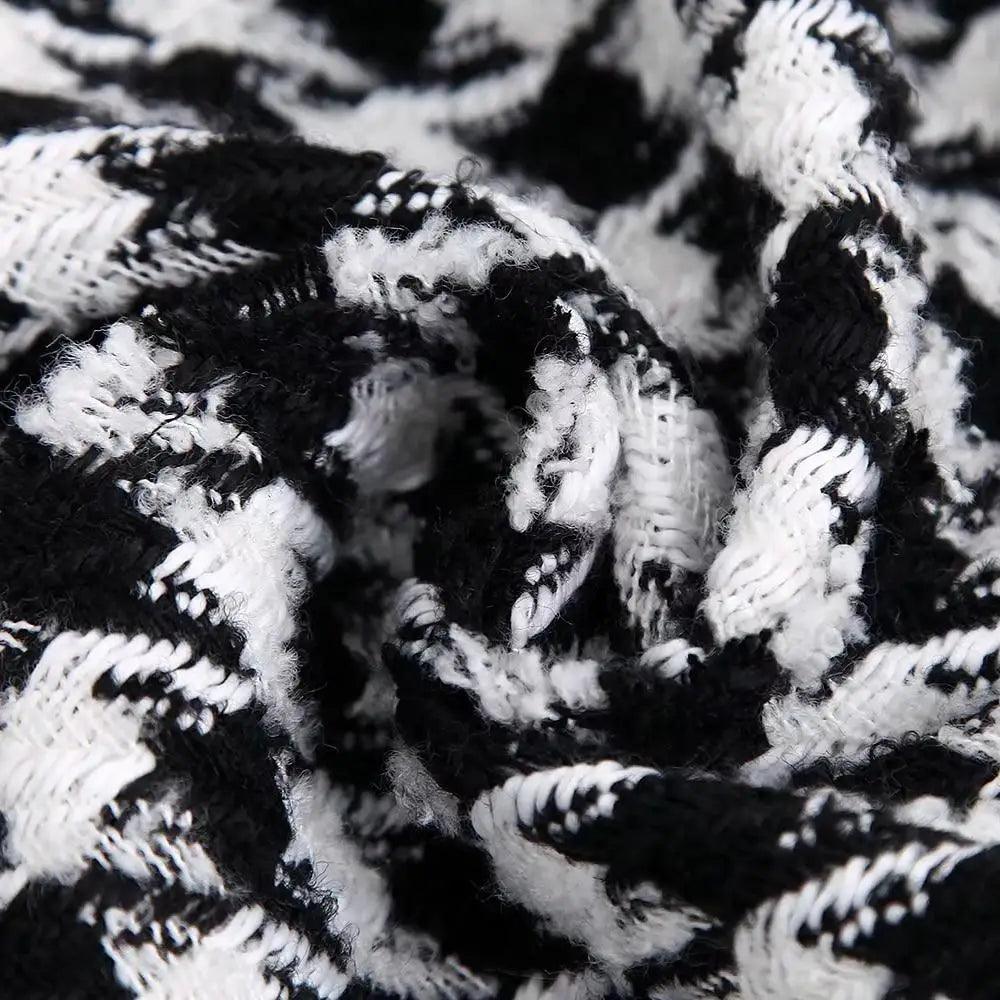 Elegance women's tweed jacket in black and white houndstooth plaid fabric close-up on Tampa Home & Garden Store