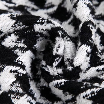 Elegance women's tweed jacket in black and white houndstooth plaid fabric close-up on Tampa Home & Garden Store