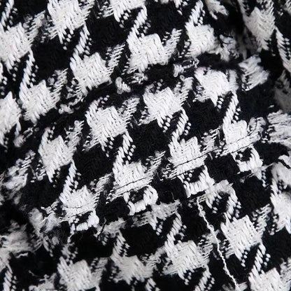 Stevvex tweed coat fabric in black and white houndstooth close-up on Tampa Home & Garden Store