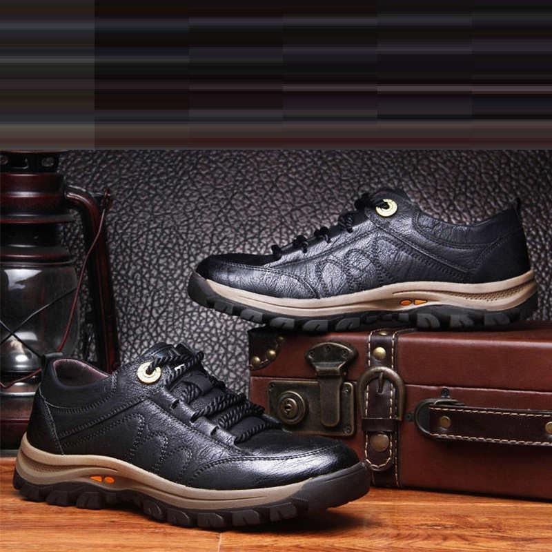 Stevvex men's black leather boots with beige sole and rugged tread pair on Tampa Home & Garden Store