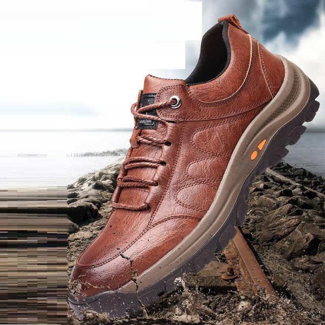 Stevvex brown leather mens boots with lace-up, platform sole and rugged tread on rocky terrain on Tampa Home & Garden Store