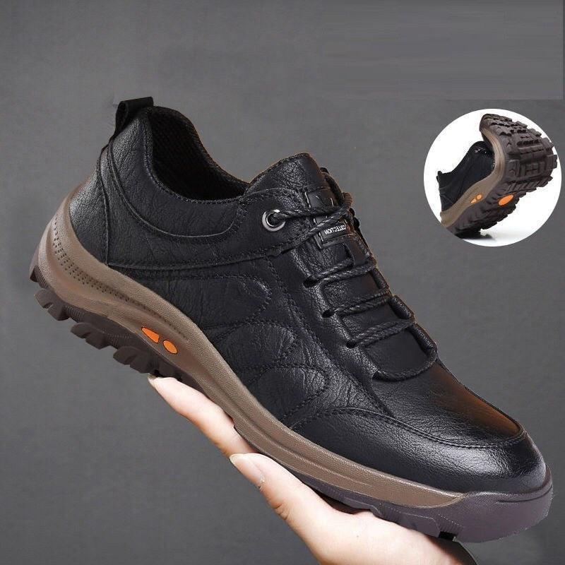 Stevvex black leather men's boots with brown sole and rugged lug outsole orange accent on Tampa Home & Garden Store