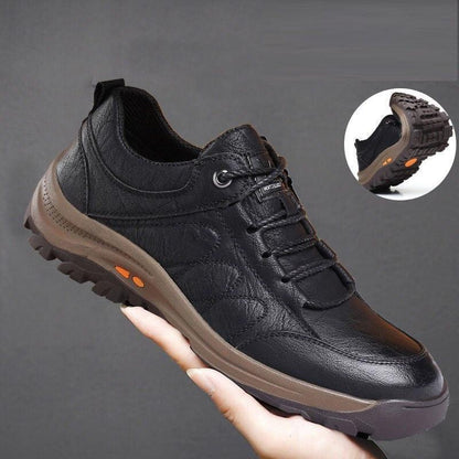 Stevvex black leather men's boots with brown sole and rugged lug outsole orange accent on Tampa Home & Garden Store