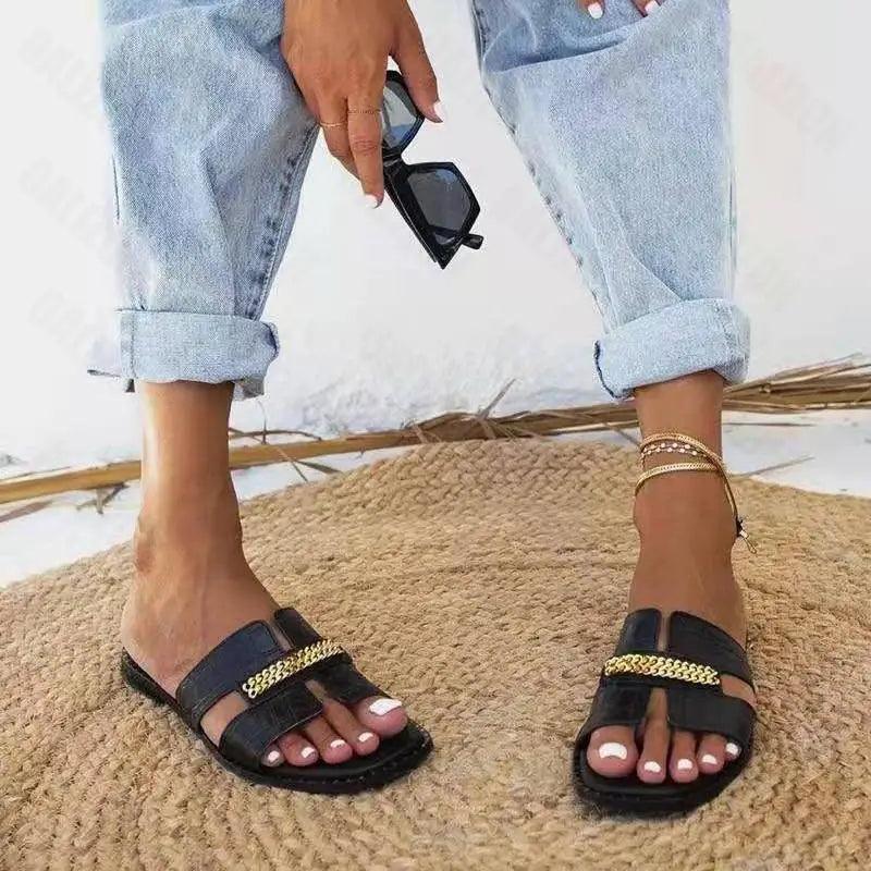 Elegant black chain flip flop sandals with gold chain strap for women by Stevvex on Tampa Home & Garden Store
