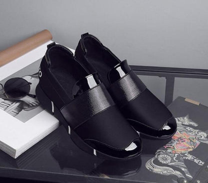 Stevvex black slip-on sneakers for women, pair with glossy strap and lightweight sole on Tampa Home & Garden Store