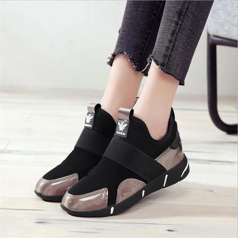 Stevvex black sneakers with breathable mesh and metallic toe caps, pull-tab straps pair on Tampa Store on Tampa Home & Garden Store