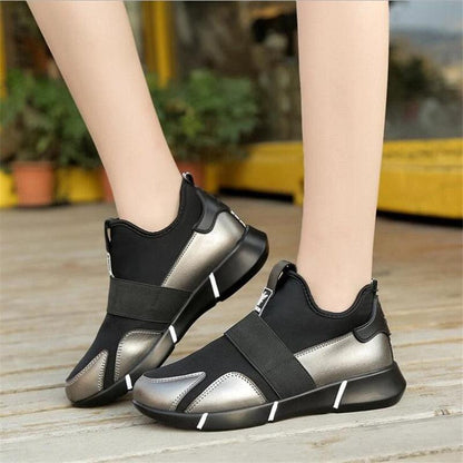 Stevvex black sneakers with metallic panels and midfoot strap, breathable walking shoes on Tampa Home & Garden Store
