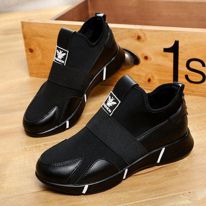 Women's Stevvex black sneakers (pair) with elastic strap, logo patch, breathable mesh upper on Tampa Home & Garden Store