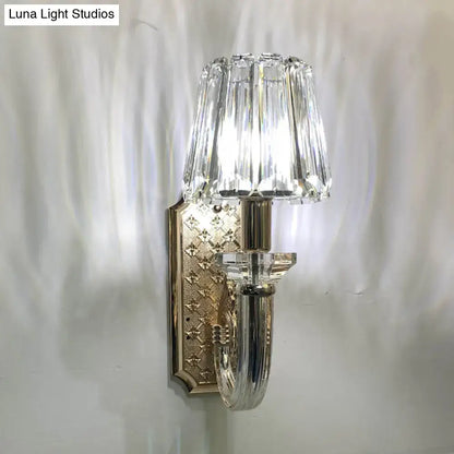 Brass crystal cone sconce with a clear crystal shade and ornate backplate by Decorbites on Tampa Home & Garden Store