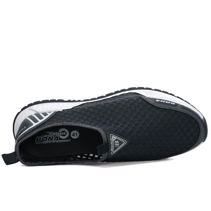 Stevvex men's sneakers, black breathable mesh upper, lightweight non-slip running shoe on Tampa Home & Garden Store