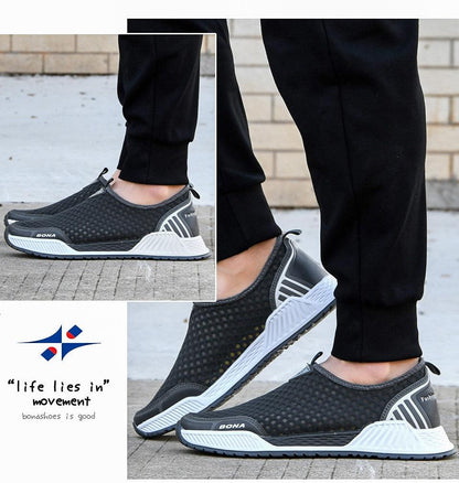 Stevvex breathable mesh sneakers, black slip-on walking shoes with white sole and grey heel on Tampa Home & Garden Store