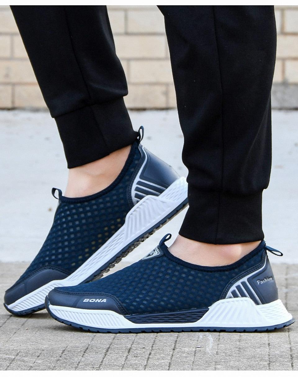 Stevvex ST85SH5558ERG navy mesh slip-on sneakers with white sole pair branded BONA on Tampa Home & Garden Store