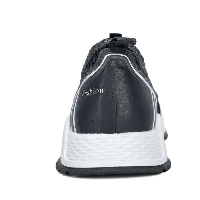 Stevvex sneakers back view with black mesh upper and white sole, fashion label on heel on Tampa Home & Garden Store