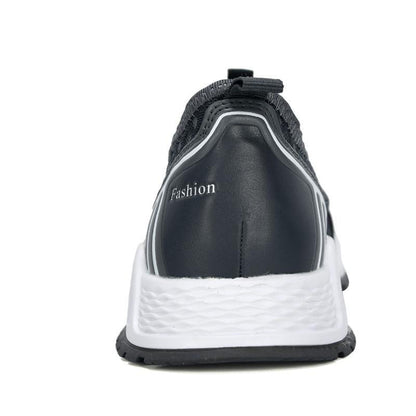 Stevvex sneakers back view with black mesh upper and white sole, fashion label on heel on Tampa Home & Garden Store