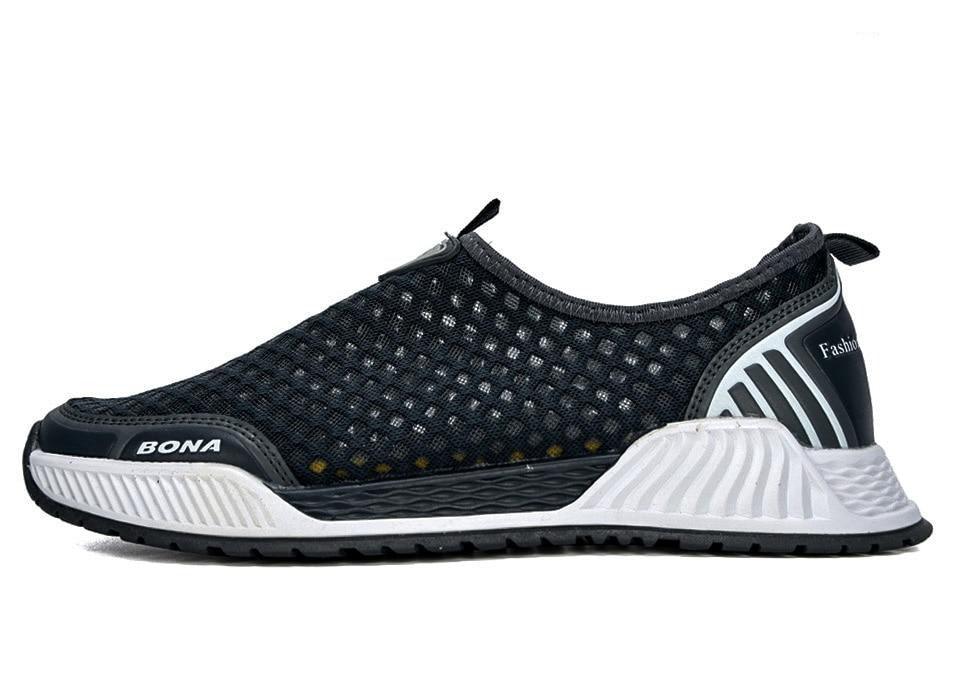 Mens breathable mesh sneakers by BONA with black upper, slip-on design and white sole on Tampa Home & Garden Store