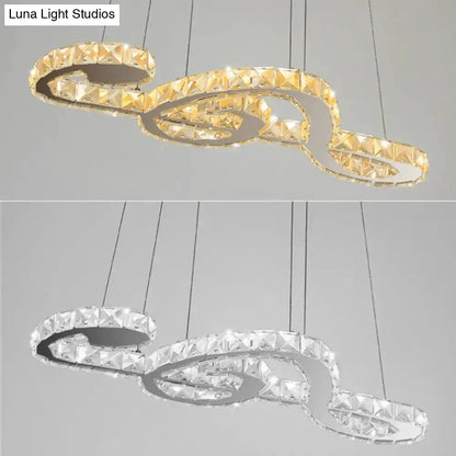 Crystal musical note pendant light with looping crystal ribbons in gold and clear finishes, Decorbites on Tampa Home & Garden Store