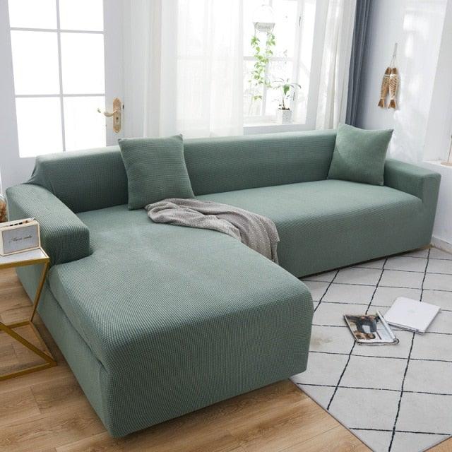 Stevvex elastic sofa cover set for L-shaped chaise sectional in teal fabric on Tampa Home & Garden Store
