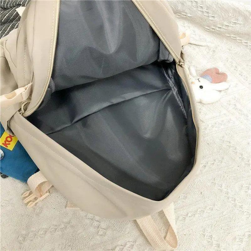 Elegant female backpack beige, dark interior, laptop compartment, by Stevvex, plush bunny charm on Tampa Home & Garden Store