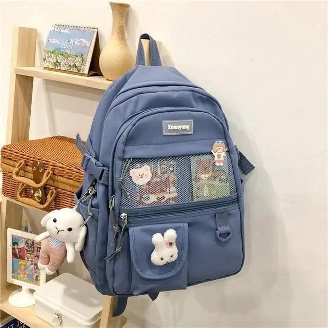 Stevvex blue school backpack with mesh front pocket and bunny keychain for teens on Tampa Home & Garden Store
