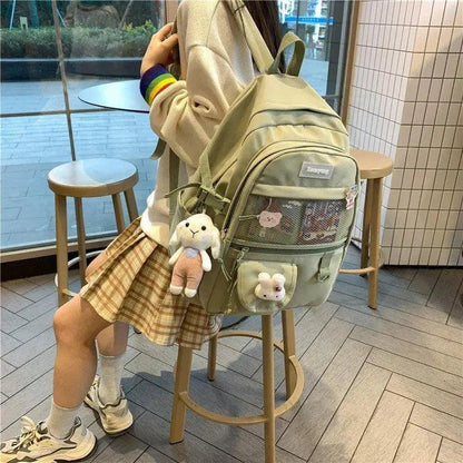Stevvex Elegant Female Backpack khaki olive with mesh front pocket and plush keychains on Tampa Home & Garden Store
