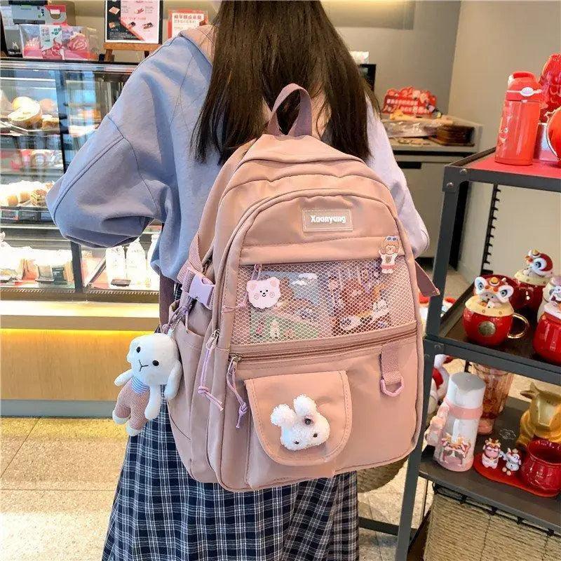 Stevvex pink elegant school backpack with mesh front pocket and bunny plush charms on Tampa Home & Garden Store