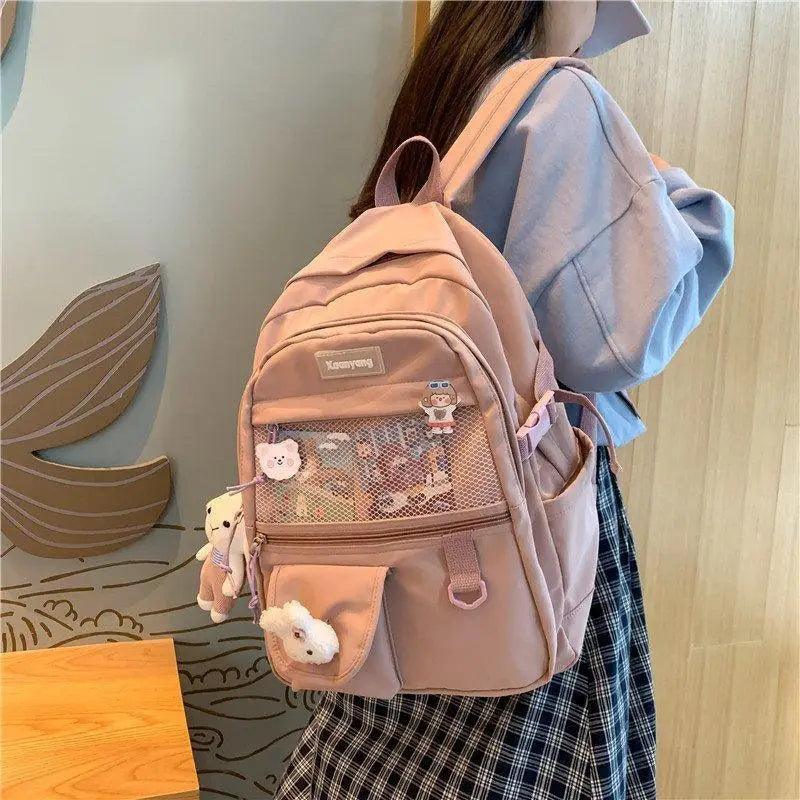 Stevvex pink school backpack with mesh pocket and plush charms on Tampa Home & Garden Store