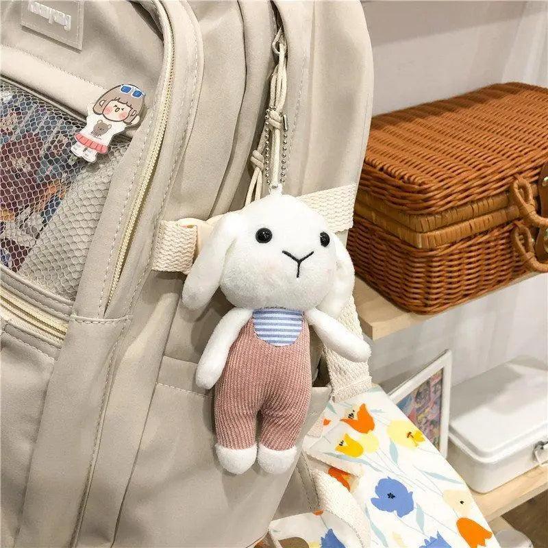 Stevvex school backpack beige with bunny plush keychain and mesh pocket for teens on Tampa Home & Garden Store
