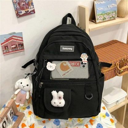 Stevvex black school backpack with front mesh pocket and cute bunny plush keychain on Tampa Home & Garden Store