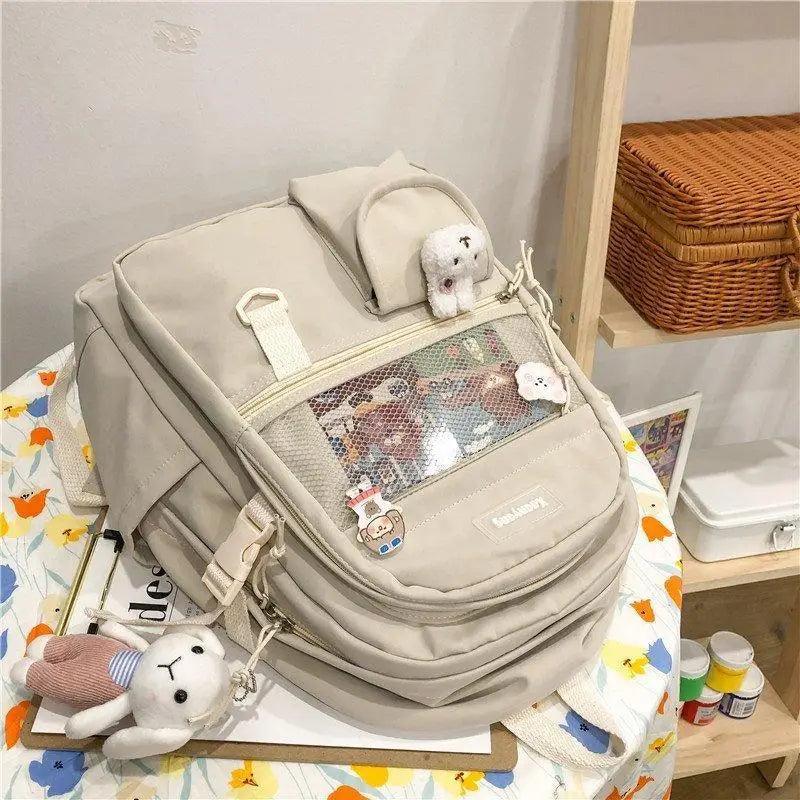 Elegant Female Backpack beige with mesh front pocket and plush charms Stevvex on Tampa Home & Garden Store