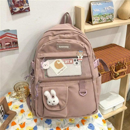 Stevvex pink school backpack with mesh front pocket and bunny keychain on Tampa Home & Garden Store