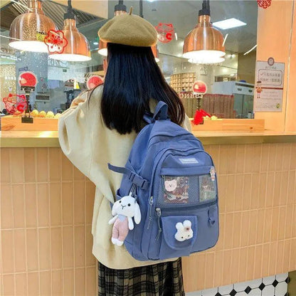 Stevvex blue school backpack with mesh pocket and multiple compartments worn by a teen girl on Tampa Home & Garden Store