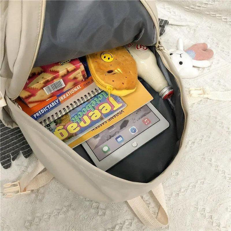 Stevvex beige female school backpack with laptop sleeve; interior shows tablet and notebook on Tampa Home & Garden Store