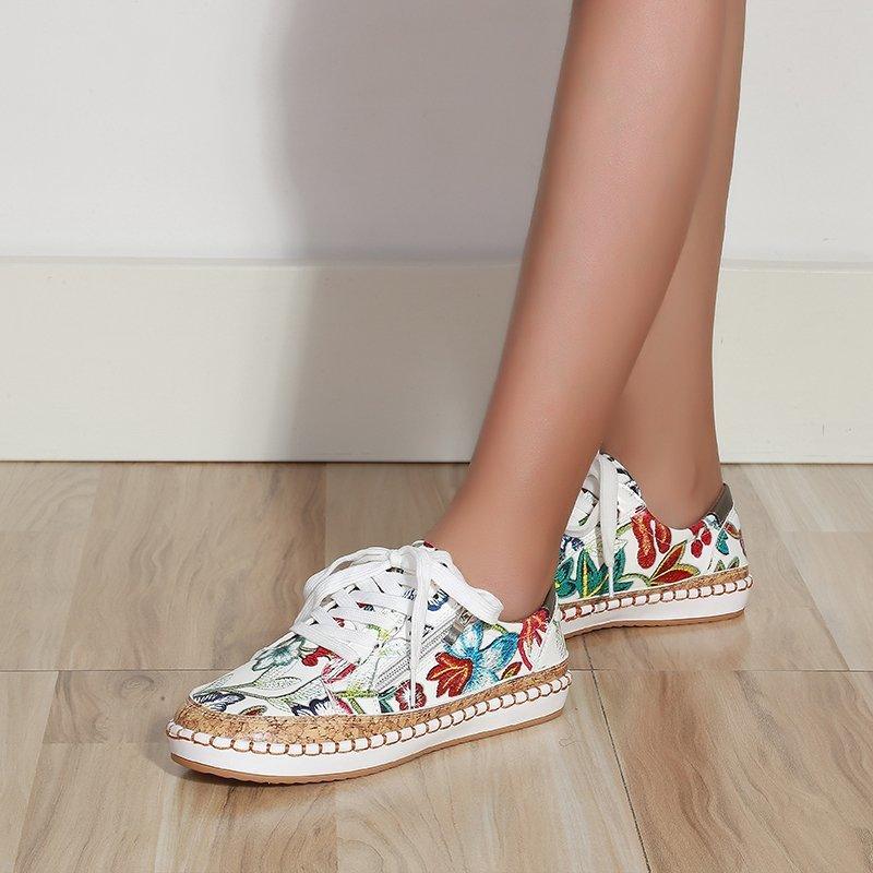 Stevvex women's floral lace-up sneakers, white with colorful botanical pattern, round toe on Tampa Home & Garden Store