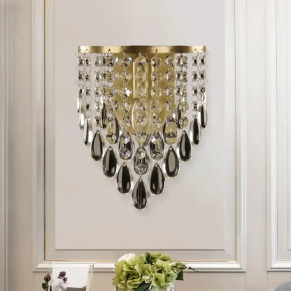 Brass crystal beveled single-light sconce with hanging crystal drops by Decorbites on Tampa Home & Garden Store
