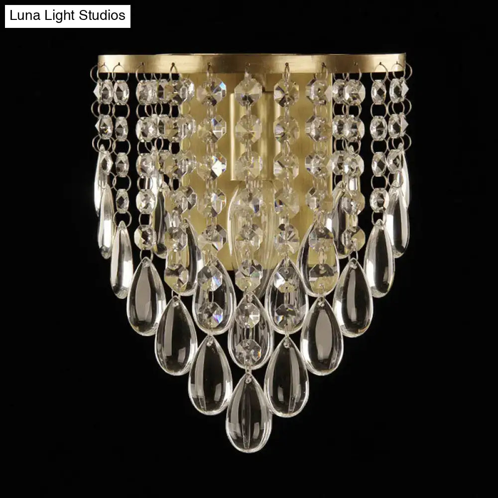 Brass crystal beveled single-light sconce by Decorbites with cascading teardrop prisms on Tampa Home & Garden Store