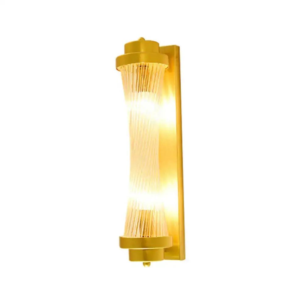 Elegant gold crystal prism wall sconce light by Decorbites, gold finish with ribbed glass on Tampa Home & Garden Store